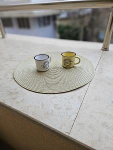 Central, quiet and modern apartment with Private Parking