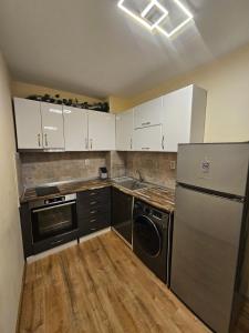 Central, quiet and modern apartment with Private Parking