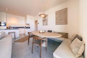 Top uitzicht luxe appartement DUNES met terras POOL & GYM