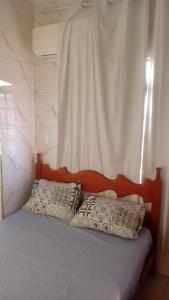 Casinha duas quadras da praia