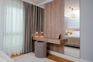 Two-Bedroom Family Suite in Managed Aparthotel - Central Location with Elevator - Parking & Secure Access