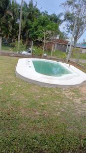 CASA com PISCINA EM TORRES 6 PESSOAS 2 QUADRAS DO MAR