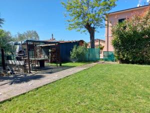 Casa con giardino