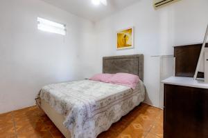 Casa com Churrasqueira e Rede a 210 m da Praia