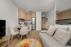 Stylish Apartments for 4 People with Underground Parking by Noclegi Renters