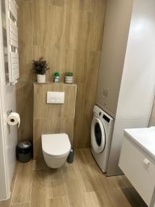 KOŁOBRZEG POLANKI AQUA Apartamenty PREMIUM - bezpłatny PARKING BASENY SAUNY BAWIALNIA SIŁOWNIA