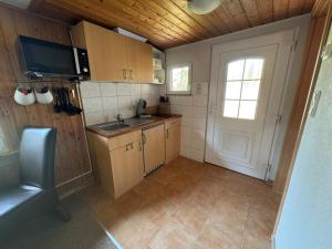 Huhnhaus – Rustikales Blockbohlenhaus Zinnowitz