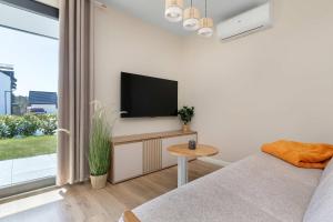 Przytulny Apartament z Ogrodem i Parkingiem by Noclegi Renters