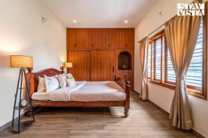 StayVista at Bean and Brick Villa with Bonfire & Garden