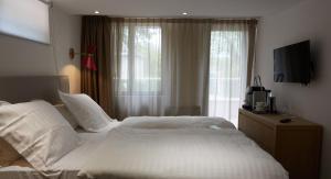 Hotels Le Cise, The Originals Relais (Relais du Silence) : photos des chambres