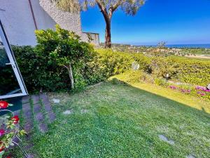 BILO BELVEDERE SX - Bilocale con giardino, wifi e vista mare
