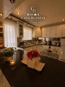 Casa Blanco Metro Port Suites