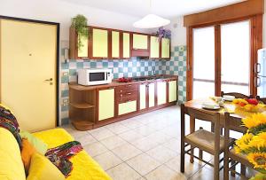 Villaggio Olimpia-Perseo, with a large wooded park, 3 swimming pools, tennis courts and a bar