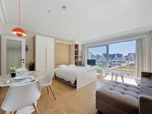 Apartment Cosy @ the beach studio with pool by Interhome