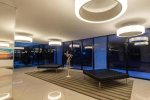 Apartamento beira-mar com piscina