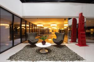 Apartamento beira-mar com piscina