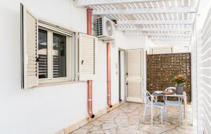 2 Bedroom Lovely Apartment In Porto Cesareo