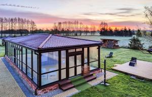Nice Home In Darlowo With Sauna