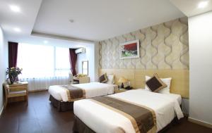 Phòng Hai Giường Đơn Loại Sang (Deluxe Twin Room)