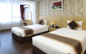 Phòng Hai Giường Đơn Loại Sang (Deluxe Twin Room)