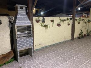 Casa de temporada espaçosa com três quartos e vagas para mais de um carro
