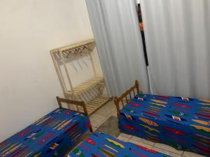 Casa de temporada espaçosa com três quartos e vagas para mais de um carro