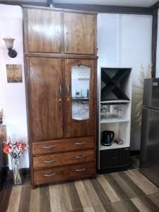 Loft with office, balcony, and grill