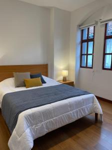 Suite Colonial Moderna con Balcón