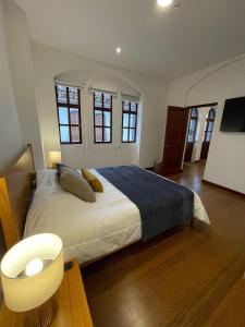 Suite Colonial Moderna con Balcón