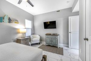 Condo with Shoreline Views and Resort Pools