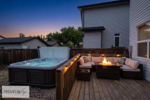 Group Retreat near West Edmonton Mall with Hot Tub, 3 Lounges & Fire Table