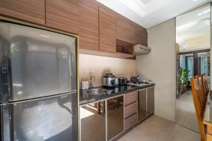 Cozy 2BR villa w- pool & garden views