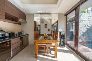 Cozy 2BR villa w- pool & garden views