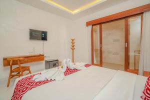 Okas Guesthouse 2 Canggu x Batu Bolong
