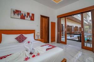 Okas Guesthouse 2 Canggu x Batu Bolong