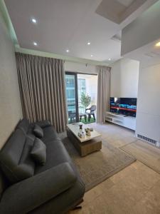 Pasha Holiday - DAMAC Tower