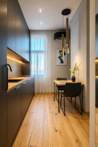 Comfort in Muted Tones - Vivien Apartments Character & Atmosphere