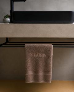 Comfort in Muted Tones - Vivien Apartments Character & Atmosphere