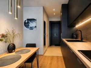 Comfort in Muted Tones - Vivien Apartments Character & Atmosphere