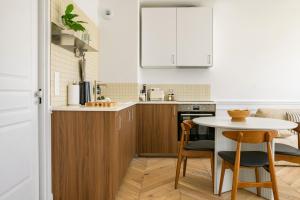 Le Grand Paris - Appartement lumineux avec balcon et parking privatif