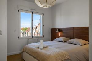 Le Grand Paris - Appartement lumineux avec balcon et parking privatif