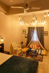 The Hidden Gem - 1BHK with Indoor Canopy, Ambient Lighting, Wifi, Smart TV & AC