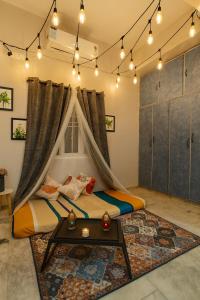 The Hidden Gem - 1BHK with Indoor Canopy, Ambient Lighting, Wifi, Smart TV & AC