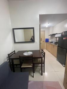 Field Residences Pool View with Balcony Near Airport behind SM sucat