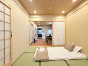 到难波4分钟 机场直达 通天阁 心斋桥 梅田 Usj14分 全新日式 2房1厅1厨2卫2浴 最多5人