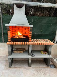 Apartamento bajo con terraza y piscina