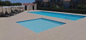 Bel appartement confortable et cosy en résidence avec piscine à 5 mn de la mer