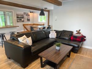 Lakefront Chalet des Sables with Private Beach & Game Room