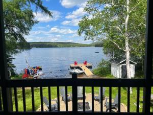 Lakefront Chalet des Sables with Private Beach & Game Room