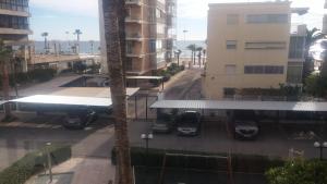 apartamento playa de Levante,parking, aire dos habitaciones y dos baños vistas playa y jardin